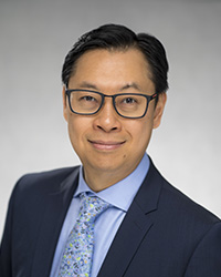 headshot of David Hung - Senior Vice President, Corporate Services