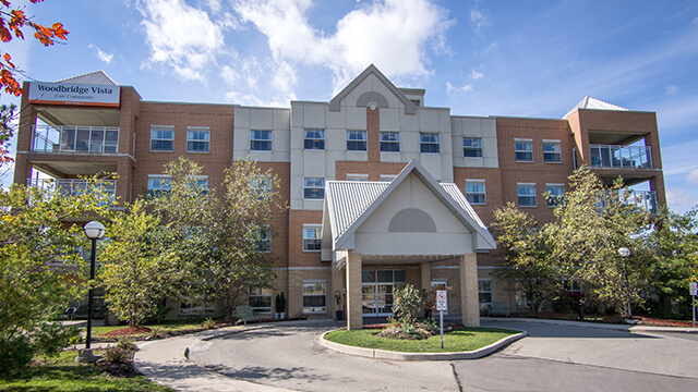 image of front entrance of Woodbridge Vista Care Community in Woodbridge