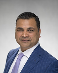 headshot of Nitin Jain - Chief Financial Officer and Chief Investment Officer